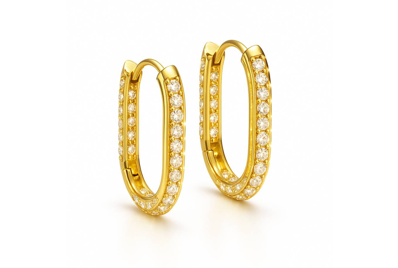 gold hoop earrings adorned with sparkly diamonds