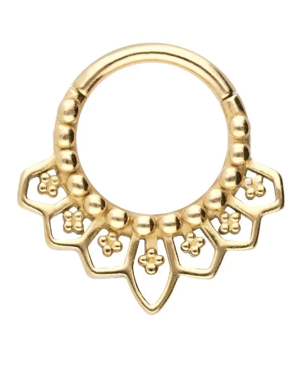 gold septum or daith jewelry featuring an oriental design