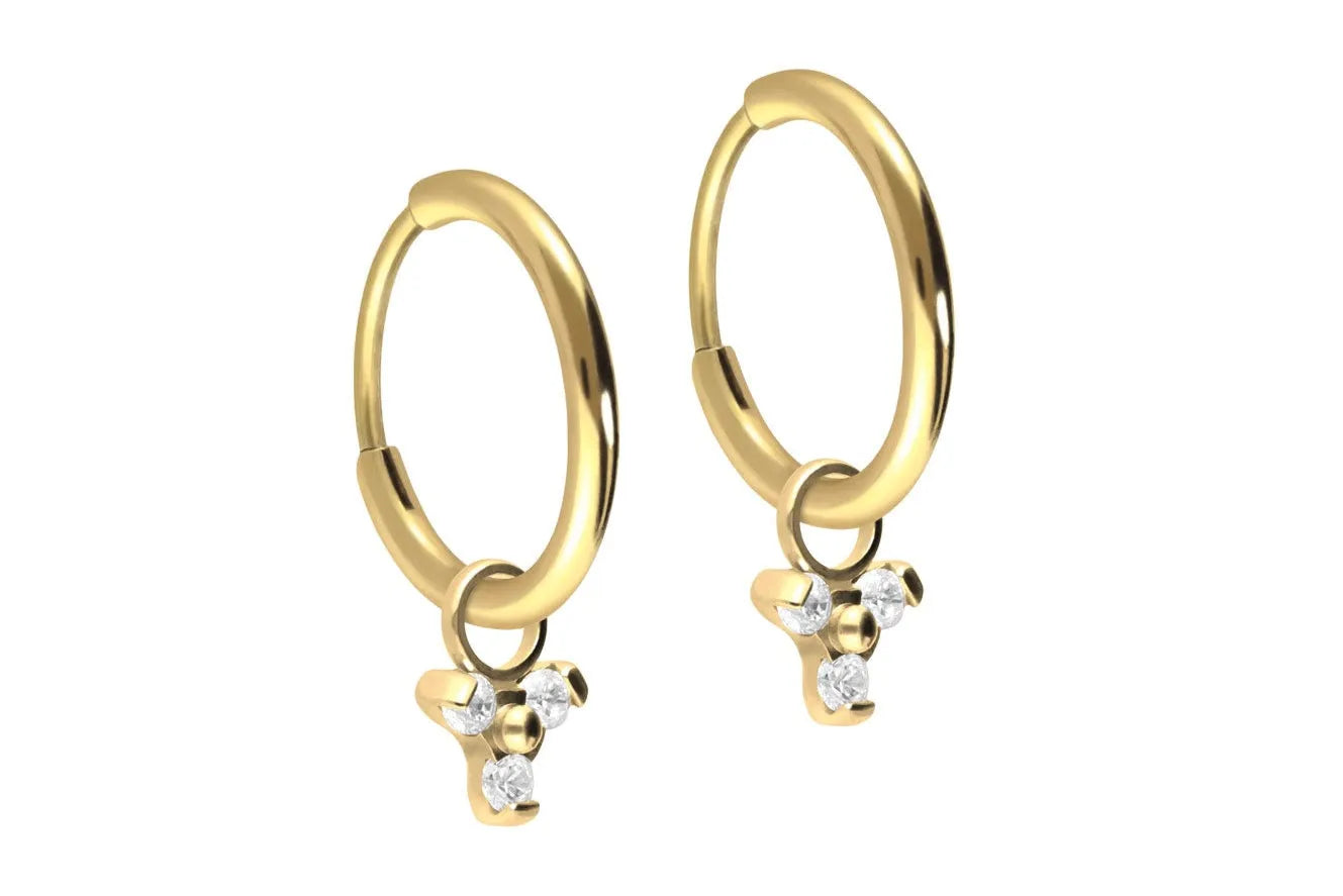 gold dangle hoop earrings with a dainty crystal trinity