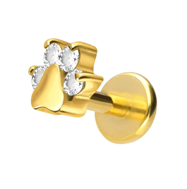 gold helix earring with a dainty crystal paw