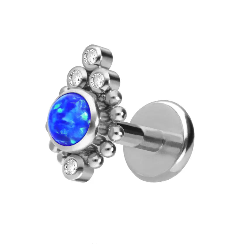 silver flat back earring with a blue opal & surrounding sparkles