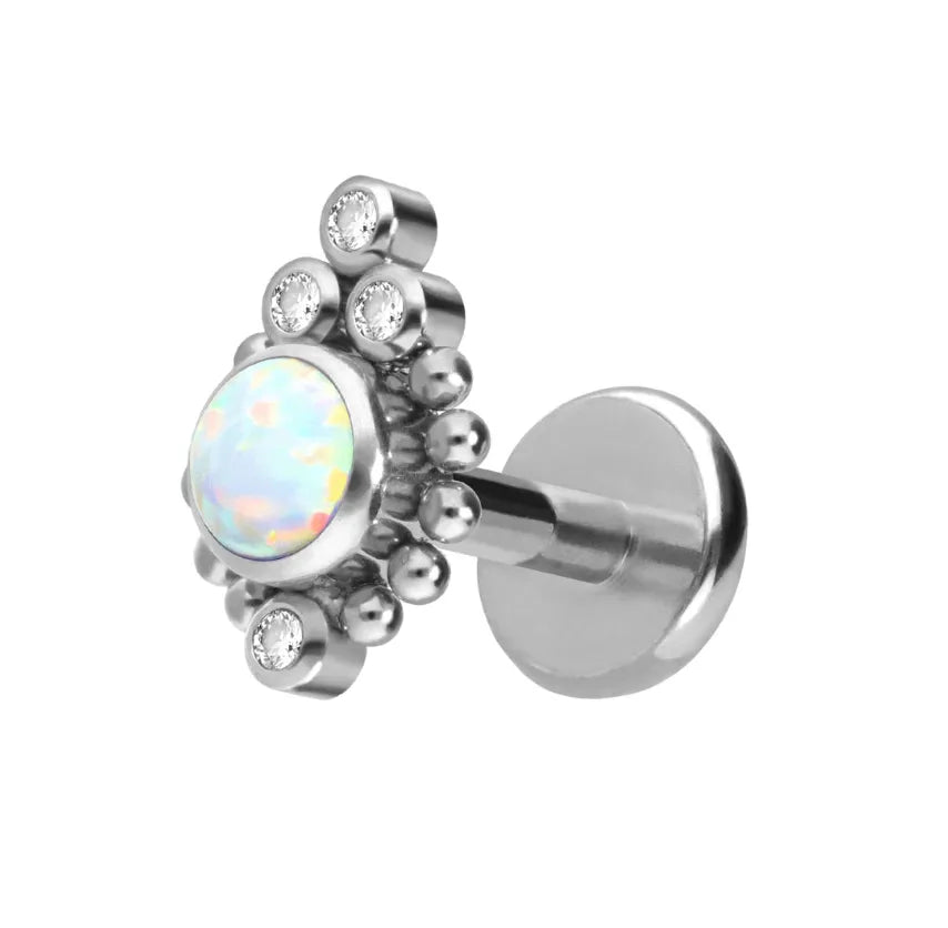 silver flat back earring with a white opal & surrounding sparkles
