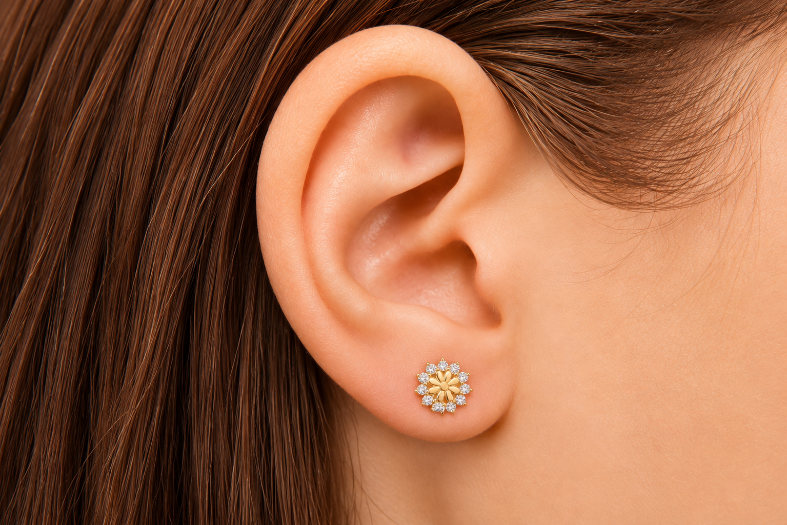 18k gold ear piercing stud featuring an extravagant crystal flower